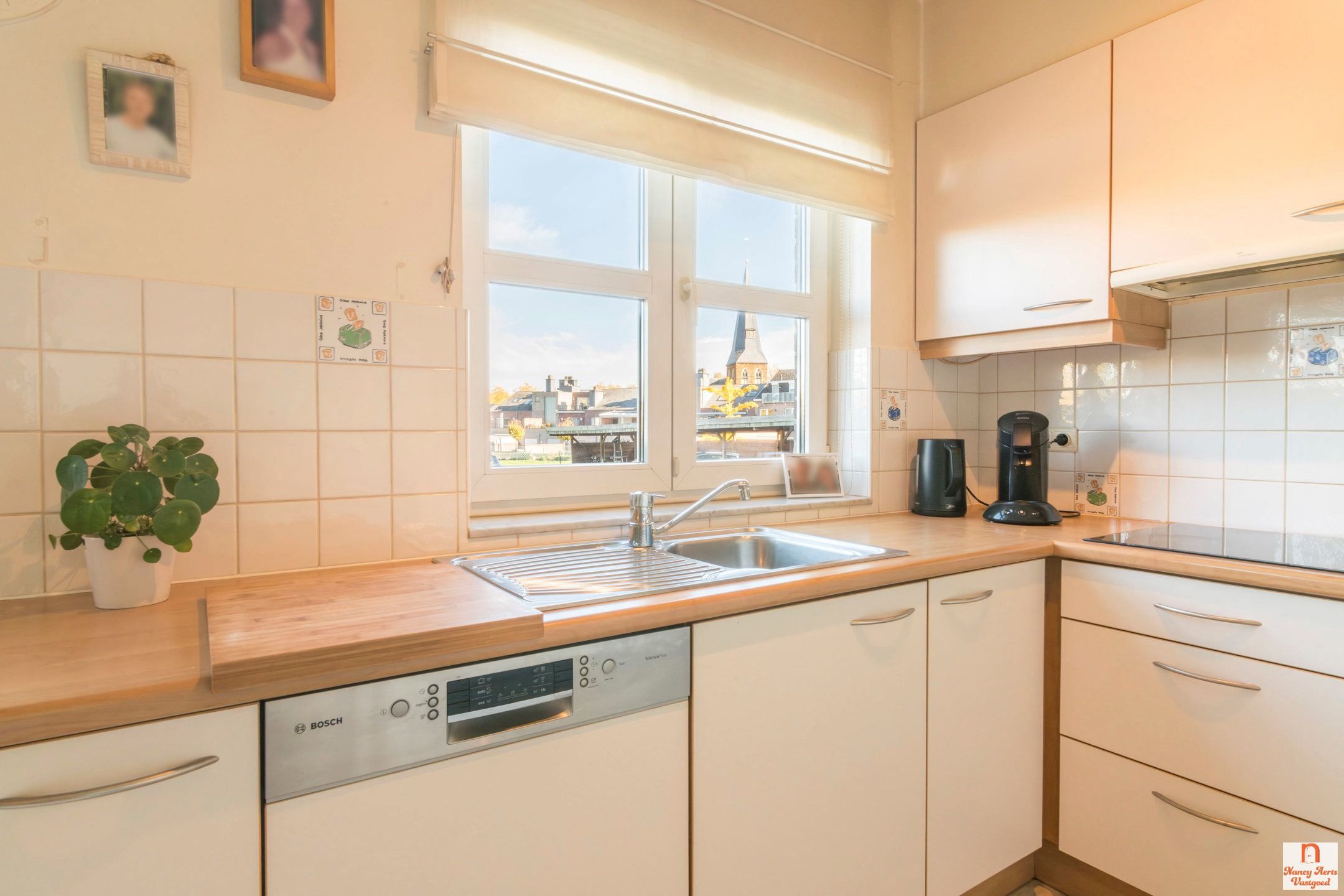 Lichtrijk gelijkvloers appartement met tuinzicht in Kuringen foto 9