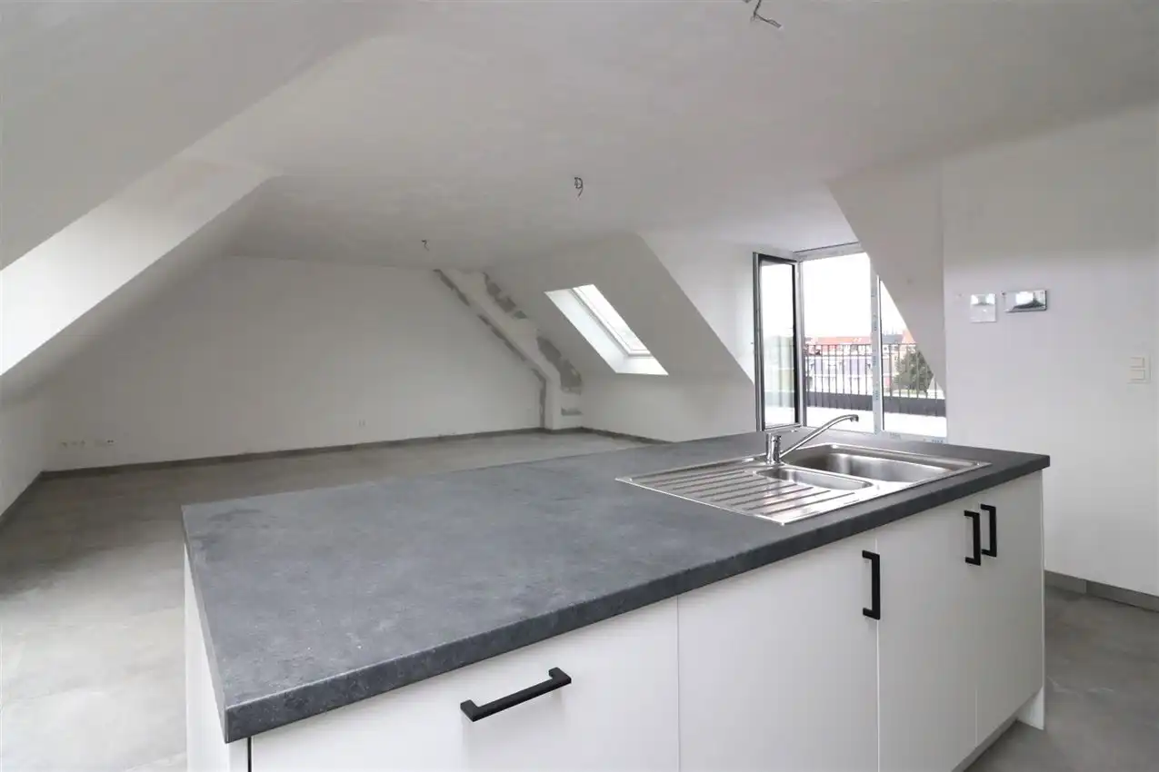 Uniek penthouse in centrum Aarschot met 1 slpk. parking en terras foto 18
