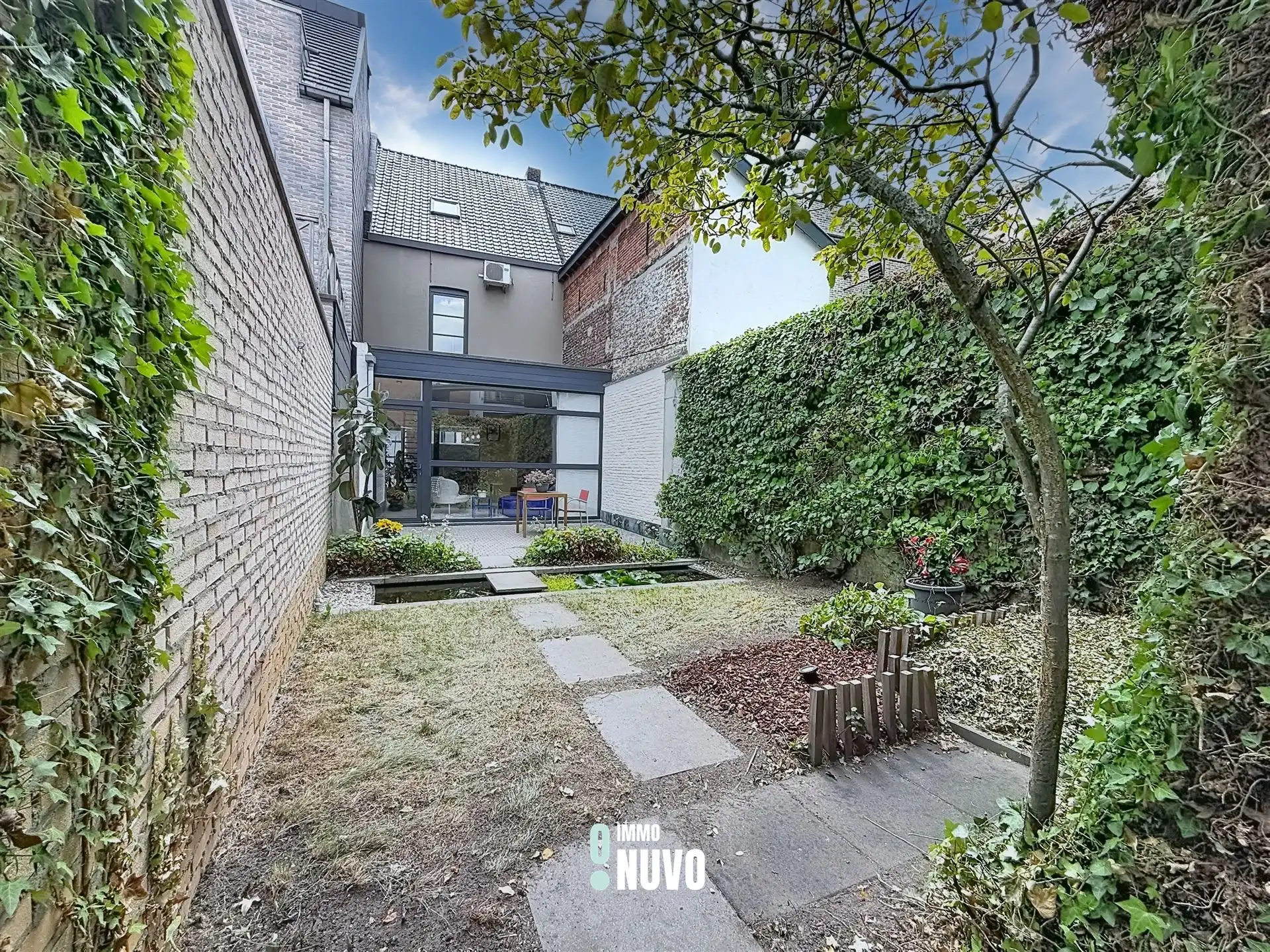 Instapklare woning met gezellige stadstuin foto 16