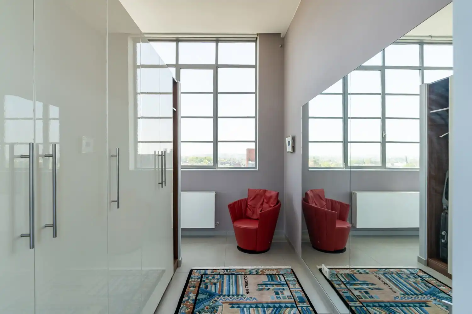 Unieke LOFT met 2 slaapkamers, een prachtig terras met een adembenemend vergezicht, 2 autostaanplaatsen en een bijzonder ruime berging aan de rand van Leuven en nabij het station van Herent! foto 15