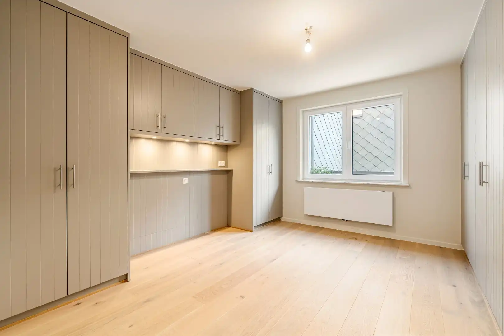 Totaal gerenoveerd appartement met open zicht en uitzonderlijke terrassen op topligging in Heist. foto 16