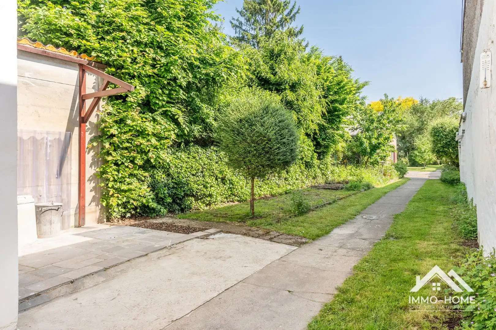 Instapklare woning met polyvalente ruimte en vrijstaande garage!  foto 3