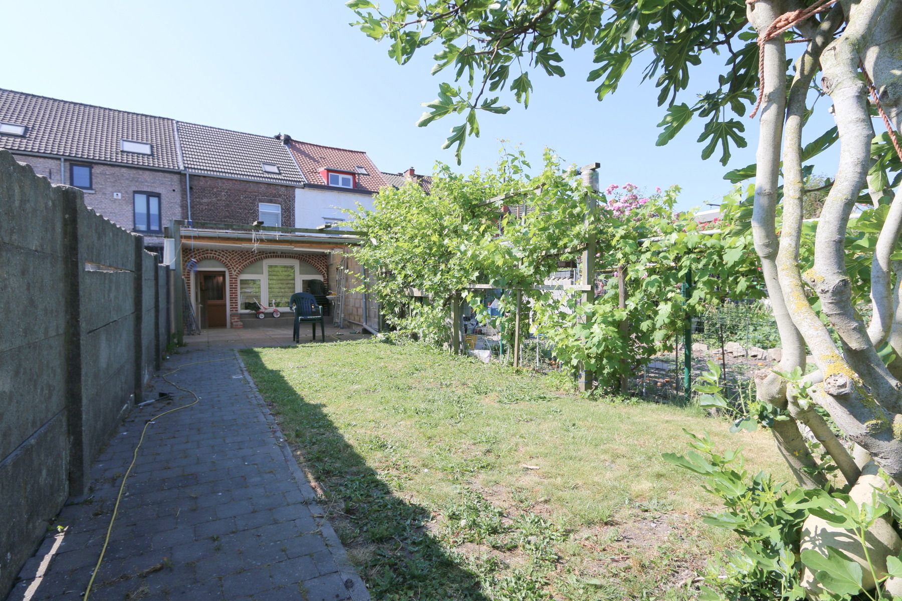 Huis - 4 slk - 2 bdk - 2 livings - tuin - terras - centrum foto 24