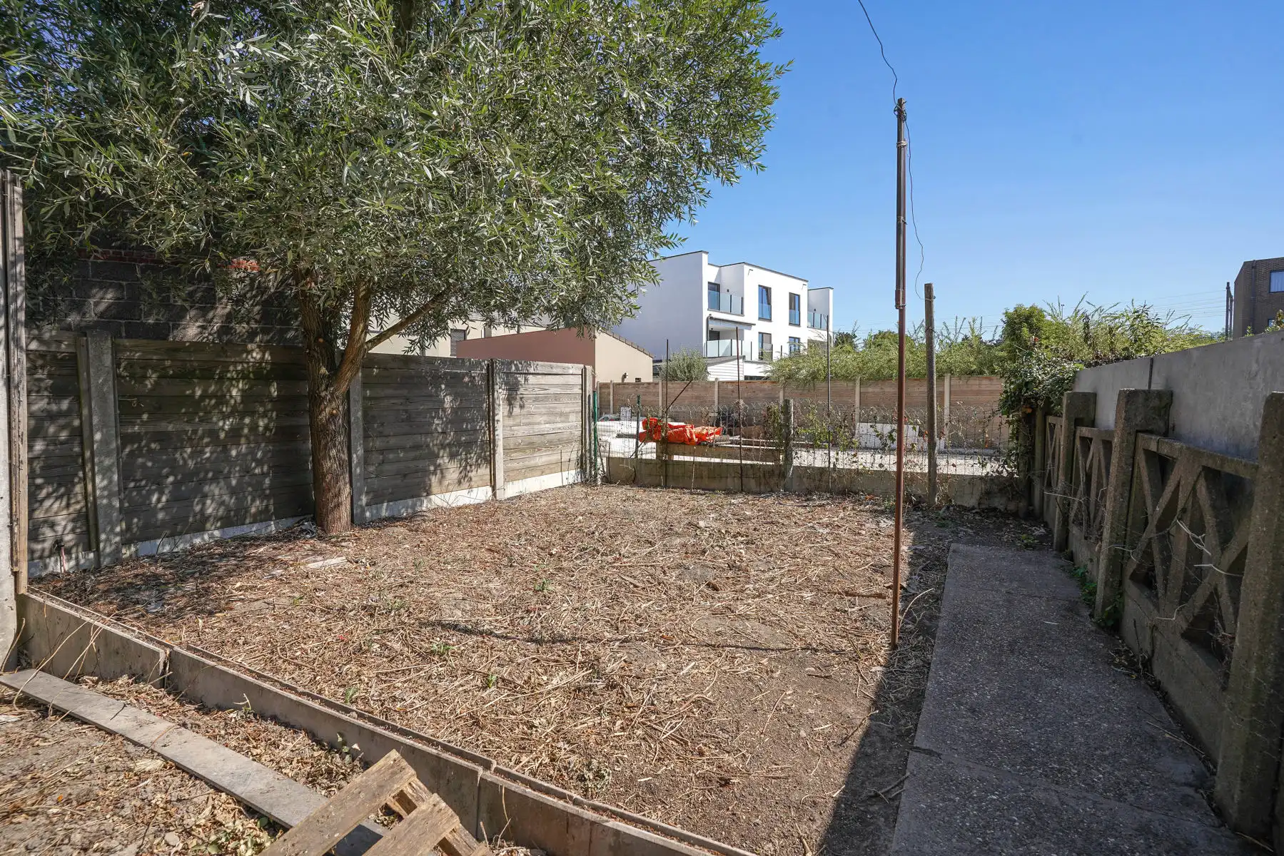 Te renoveren rijwoning met tuin te Kapelle-op-den-Bos foto 26