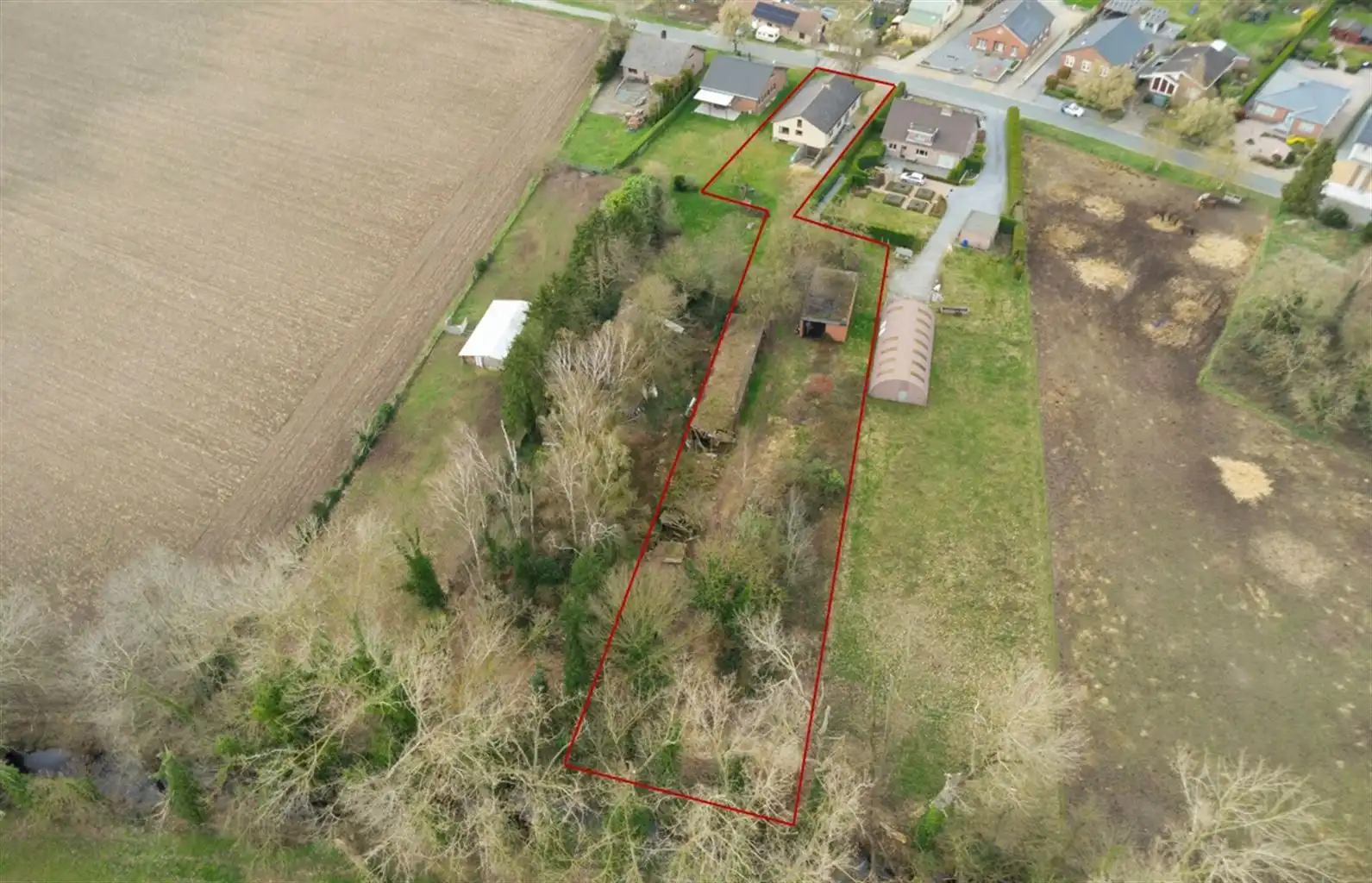 Vrijstaande woning op een uitzonderlijk perceel van 29a95ca met 4 slaapkamers en inpandige garage, gelegen op een rustige toplocatie nabij het centrum van Maaseik. foto 23