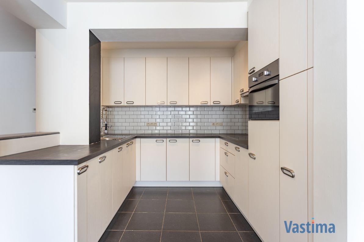 Instapklaar gelijkvloersappartement met 2 slaapkamers en zeer ruim terras foto 6