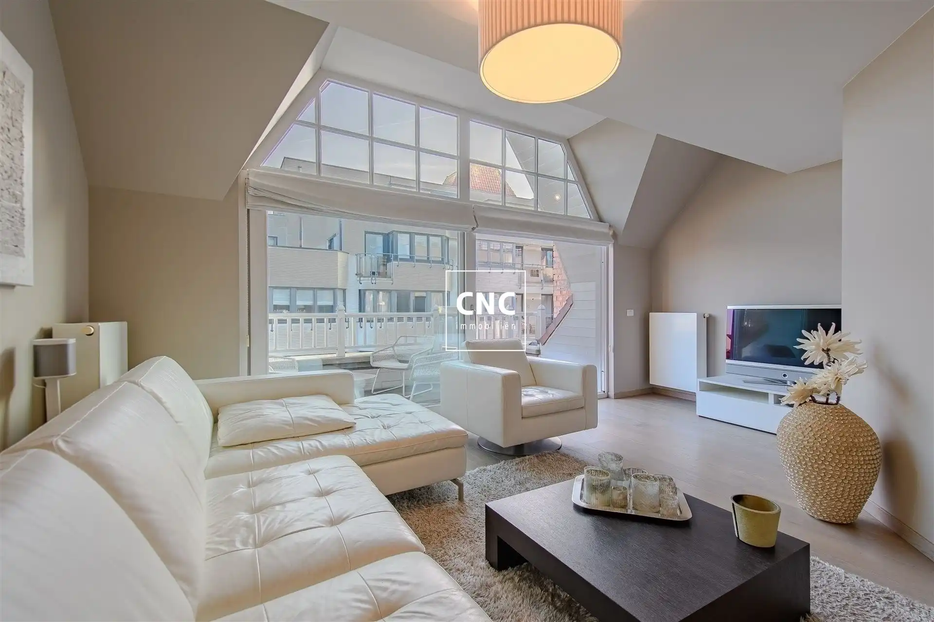 Duplex-appartement met zonneterras op toplocatie in Knokke foto {{pictureIndex}}