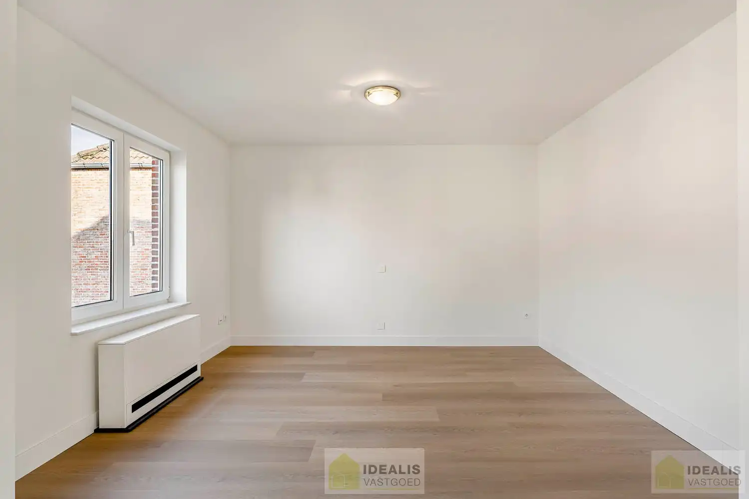 IDEALIS VASTGOED - PRACHTIG GERENOVEERD DUPLEXAPPARTEMENT IN HARTJE HAMONT! foto 2