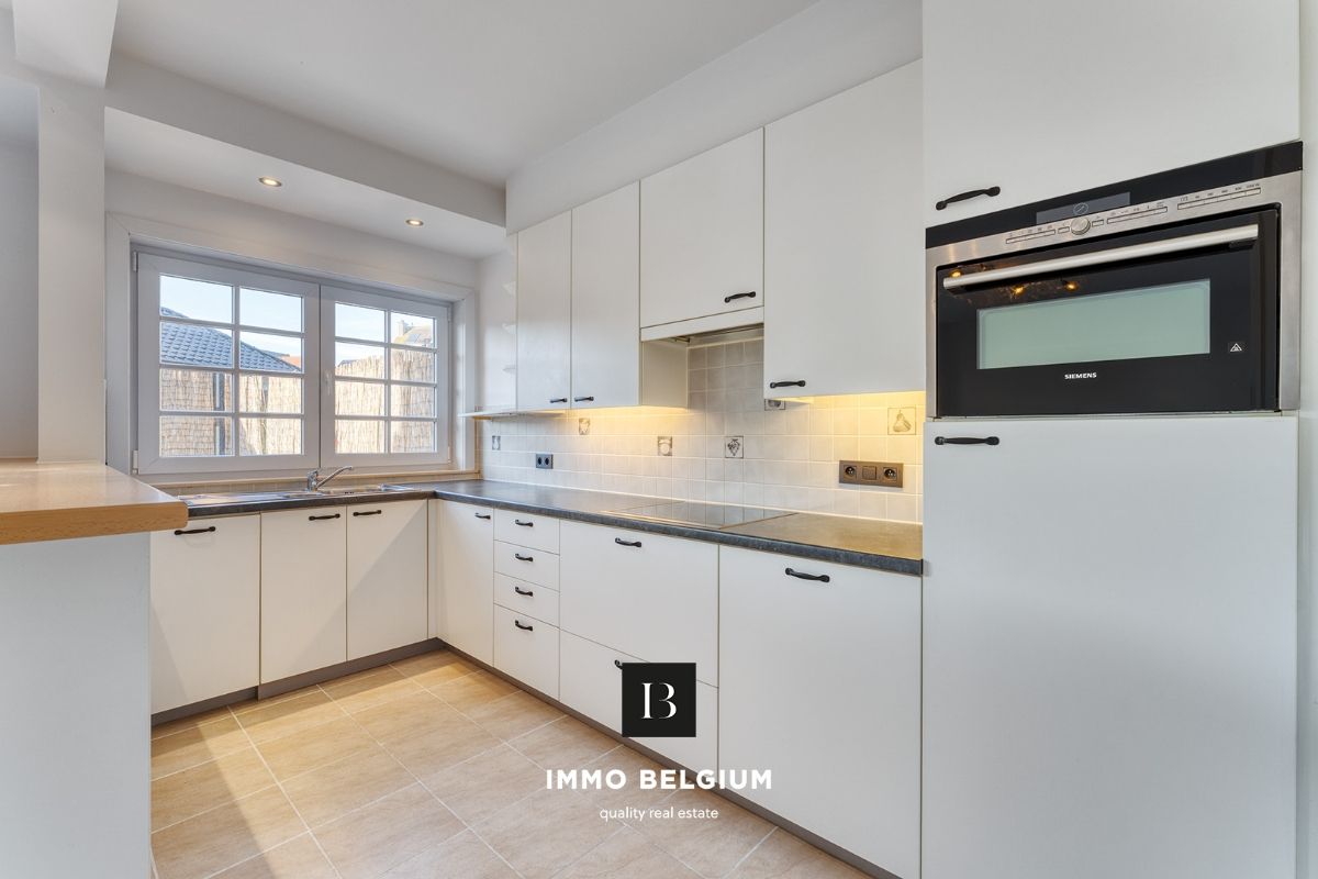 Mooi gerenoveerd appartement met tuintje nabij het centrum foto 6