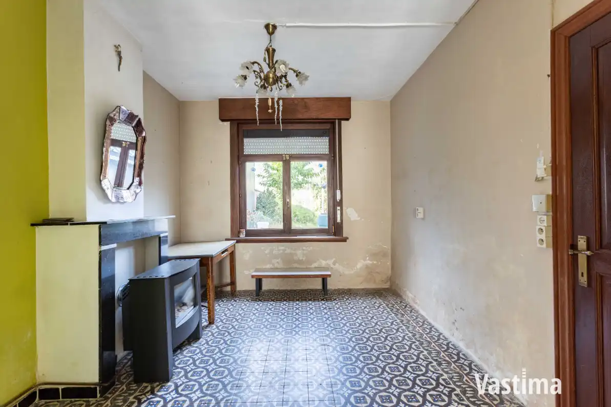 Te renoveren woning met ruime tuin foto 4