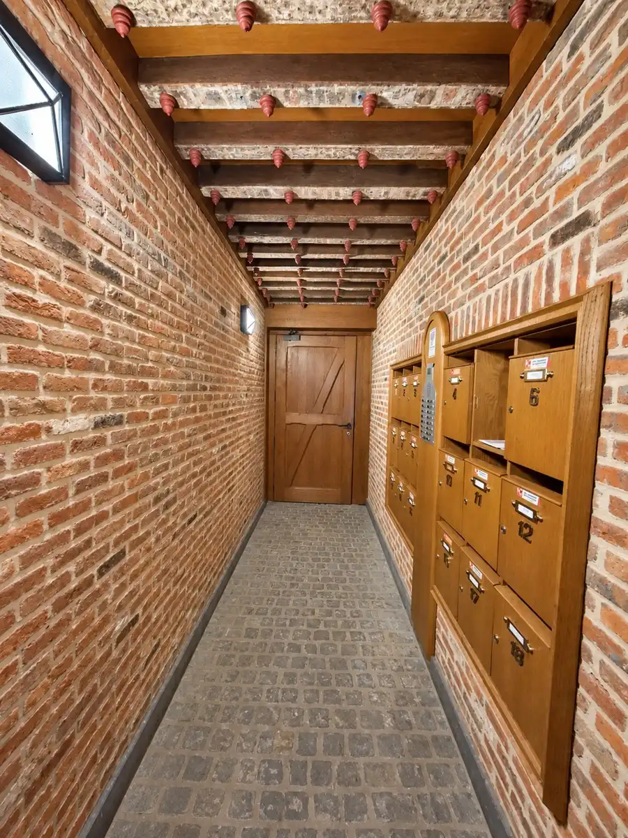 Appartement met terras en staanplaats in karaktervol historisch gebouw foto 4
