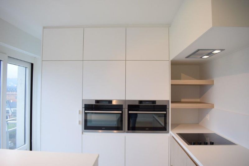 Trendy gerenoveerd app met 2 slaapkamers en garage box. foto 4