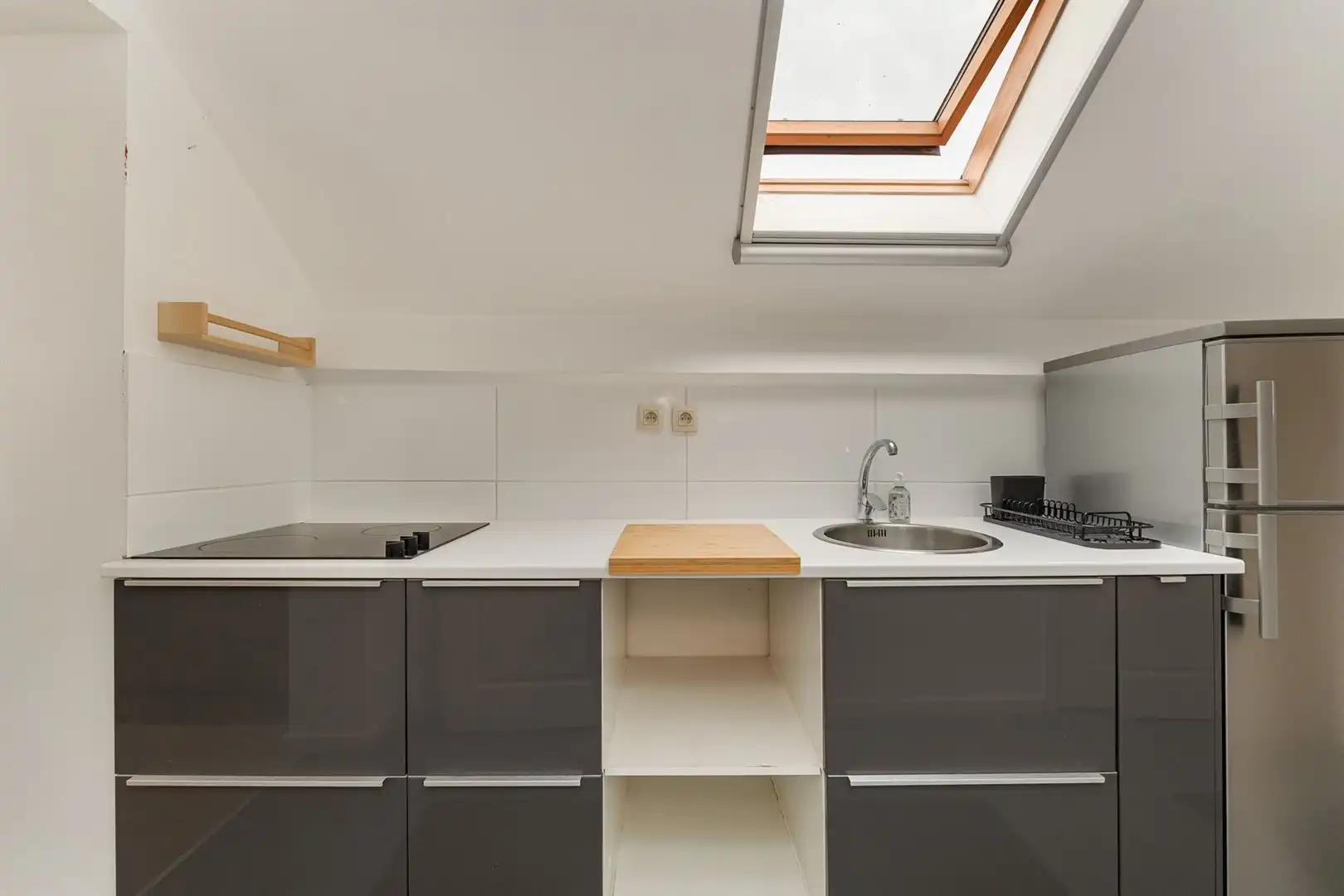 Gezellig dakappartement in een kleinschalig gebouw! foto 7