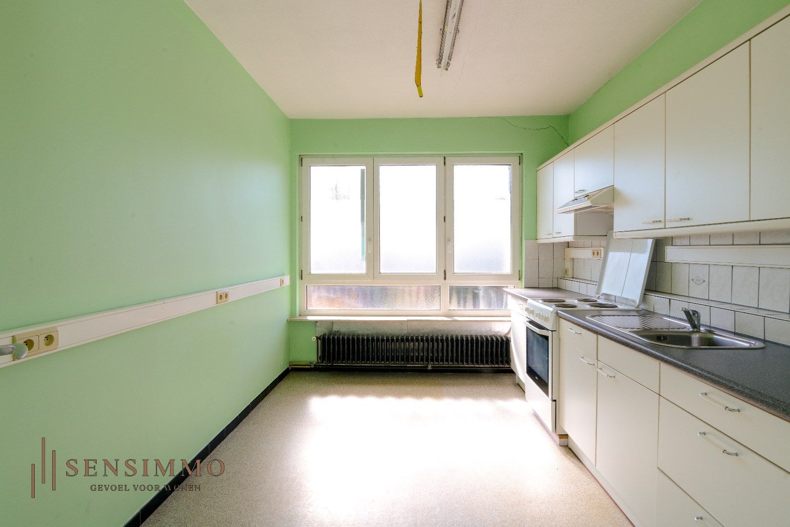 Energiezuinig dakappartement met 1 slaapkamer in Genk foto 8