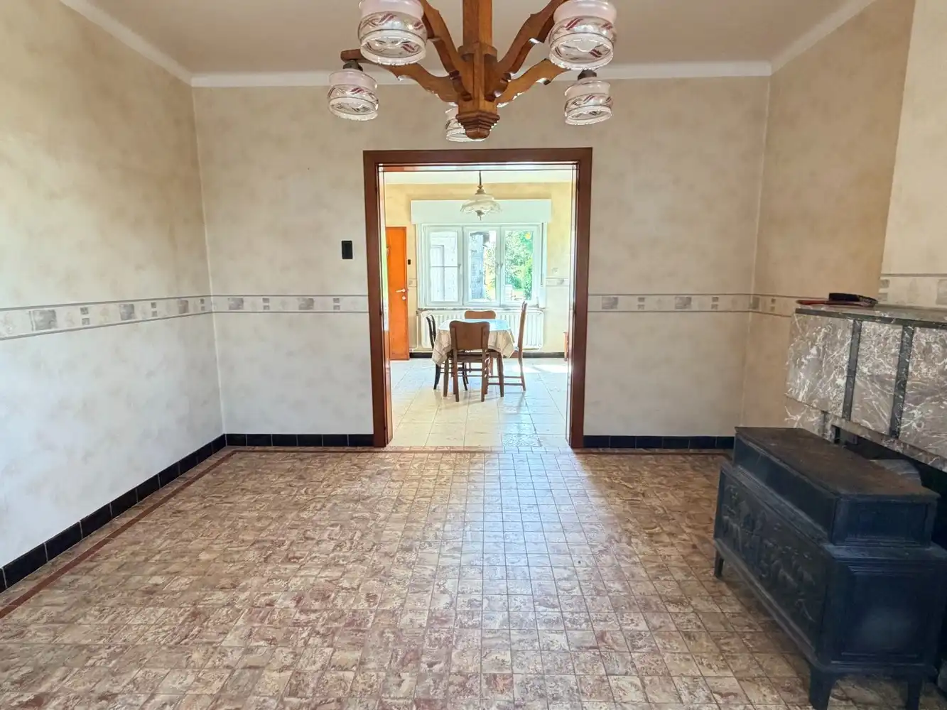 Charmante te renoveren woning op een perceel van ca. 15 are met zuidgerichte tuin foto 4