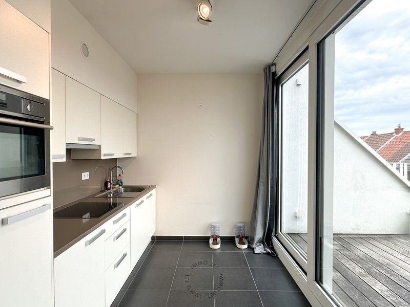 Recent appartement met 1 slaapkamer dichtbij het centrum van Beveren foto 6