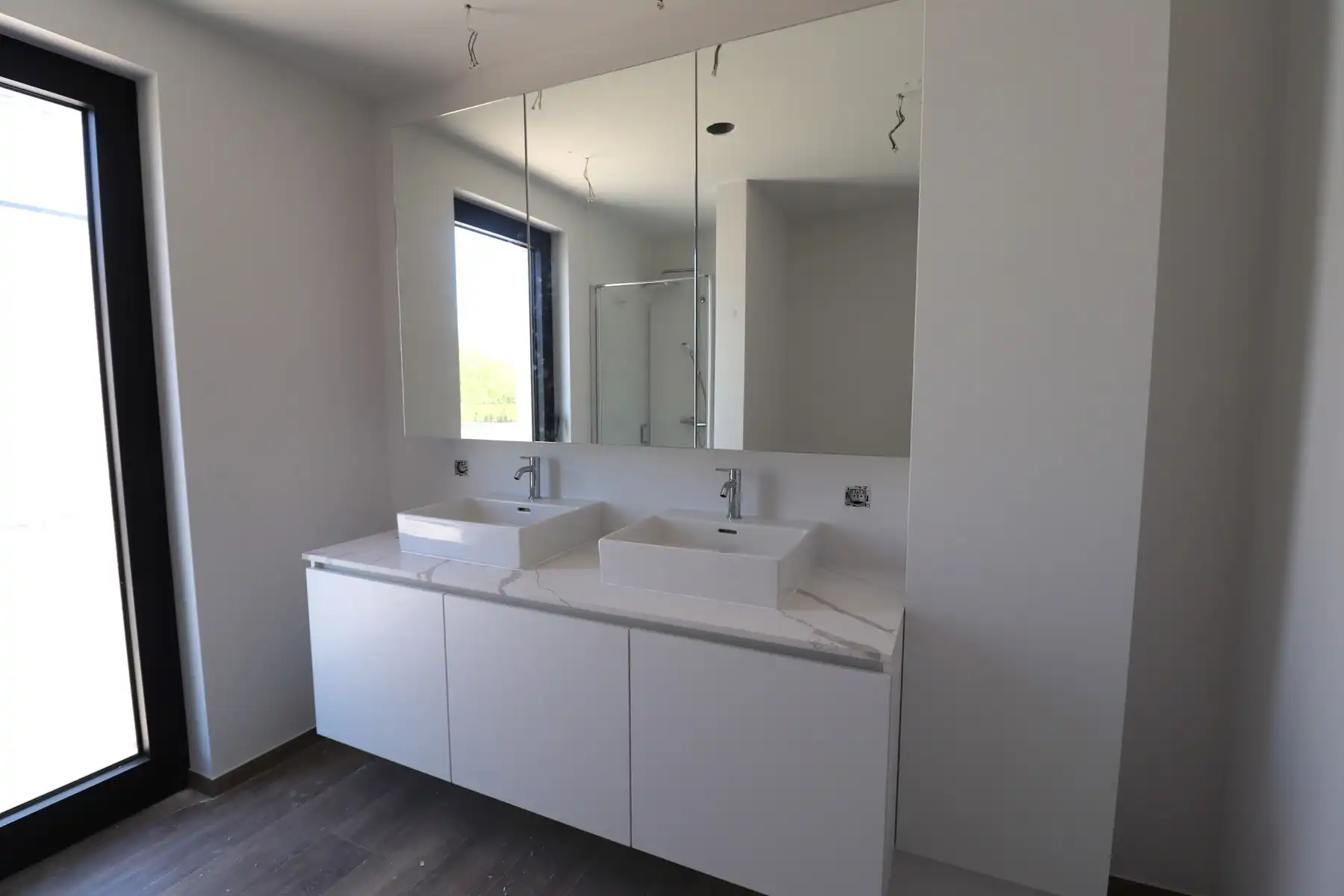 Energiezuinige nieuwbouwwoning met 4 slaapkamers, tuin en carport. foto 12