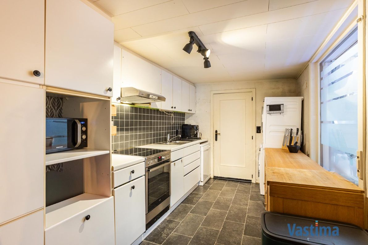 Super energiezuinige gezinswoning met tuin in hartje Nieuwerkerken foto 6