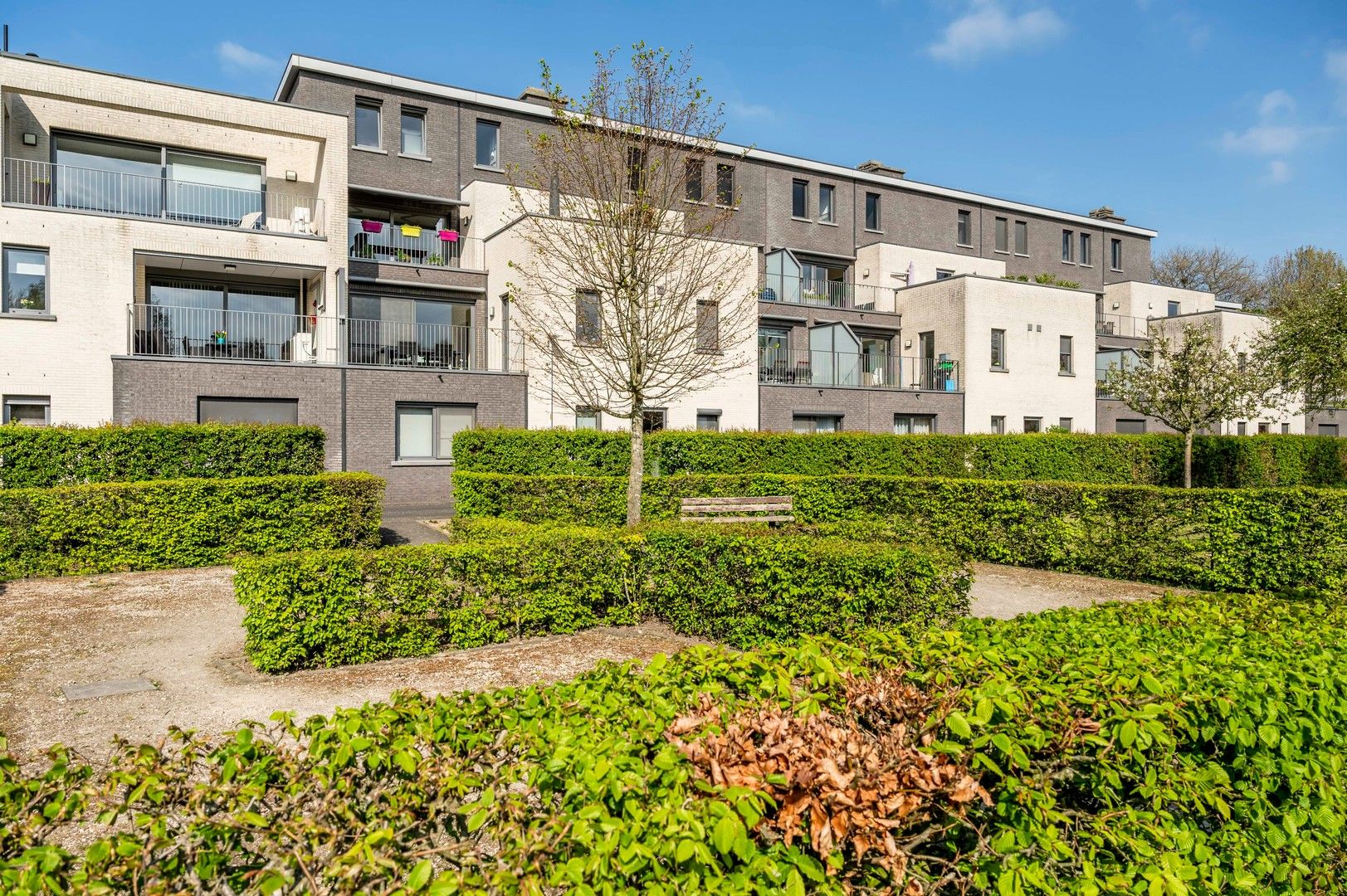 Instapklaar gelijkvloers appartement met tuin + optioneel een garage box! foto 23