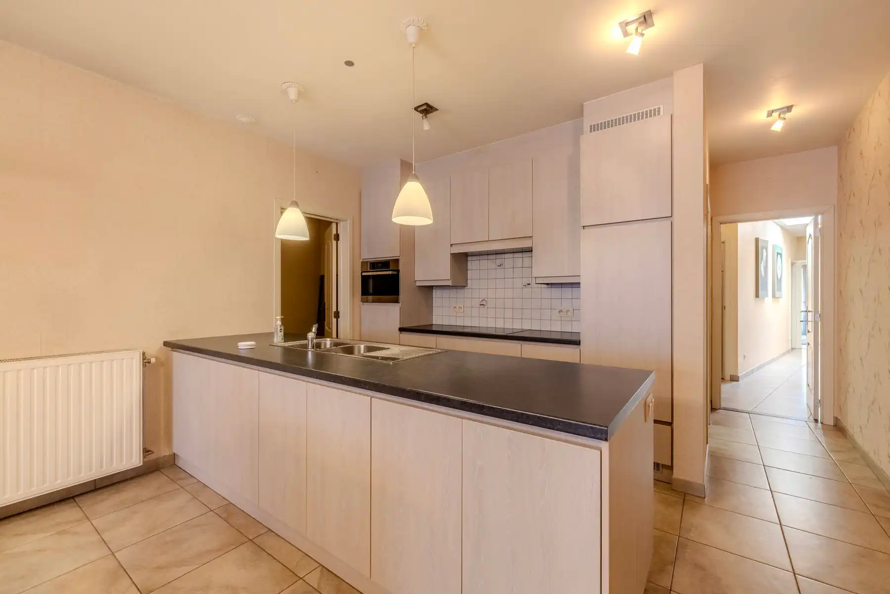 GLV app (132m²) met 2slpk, terras, garagebox en kelder foto 7