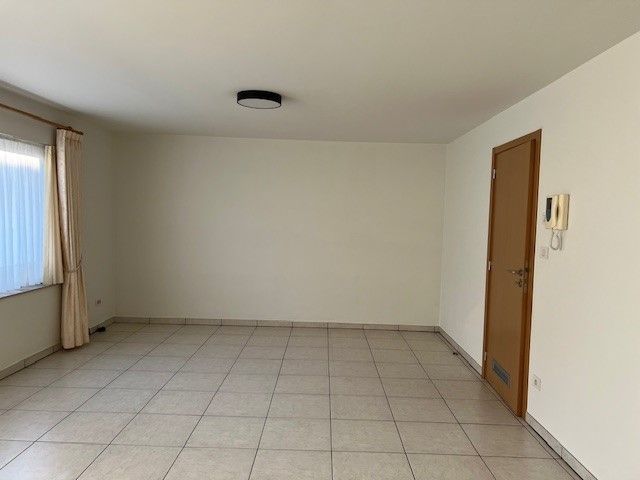 Ruim appartement met 2 slaapkamers en garage foto 2