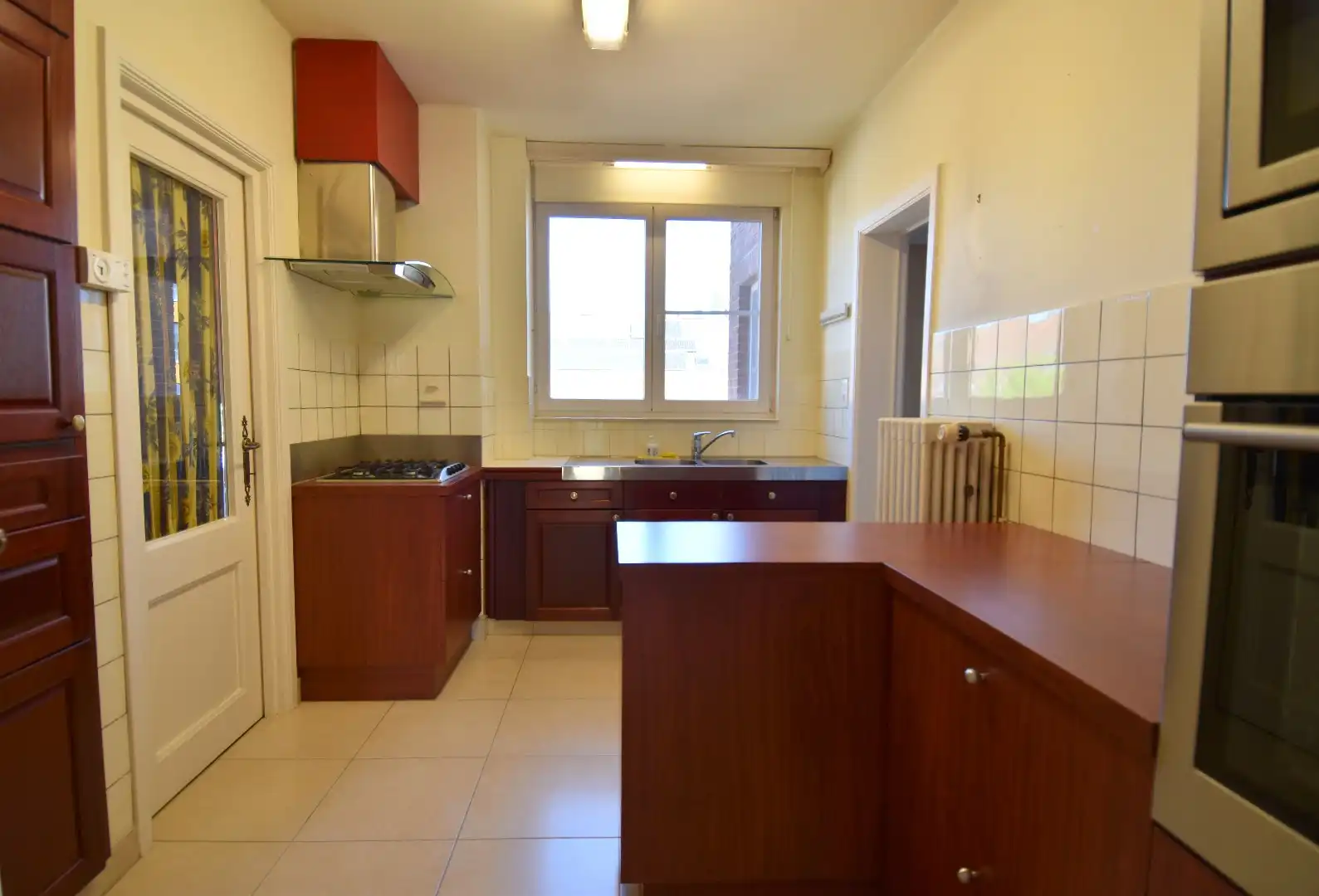 Ruim 3-slaapkamer appartement met garage in hartje Kortrijk foto 5