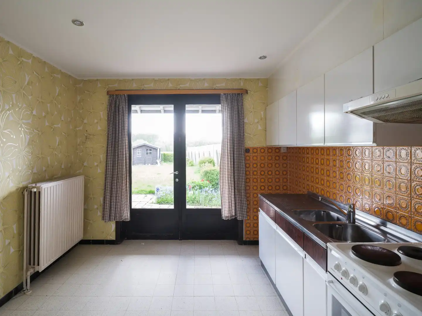 Rustig gelegen, halfopen woning met renovatiepotentieel foto 7
