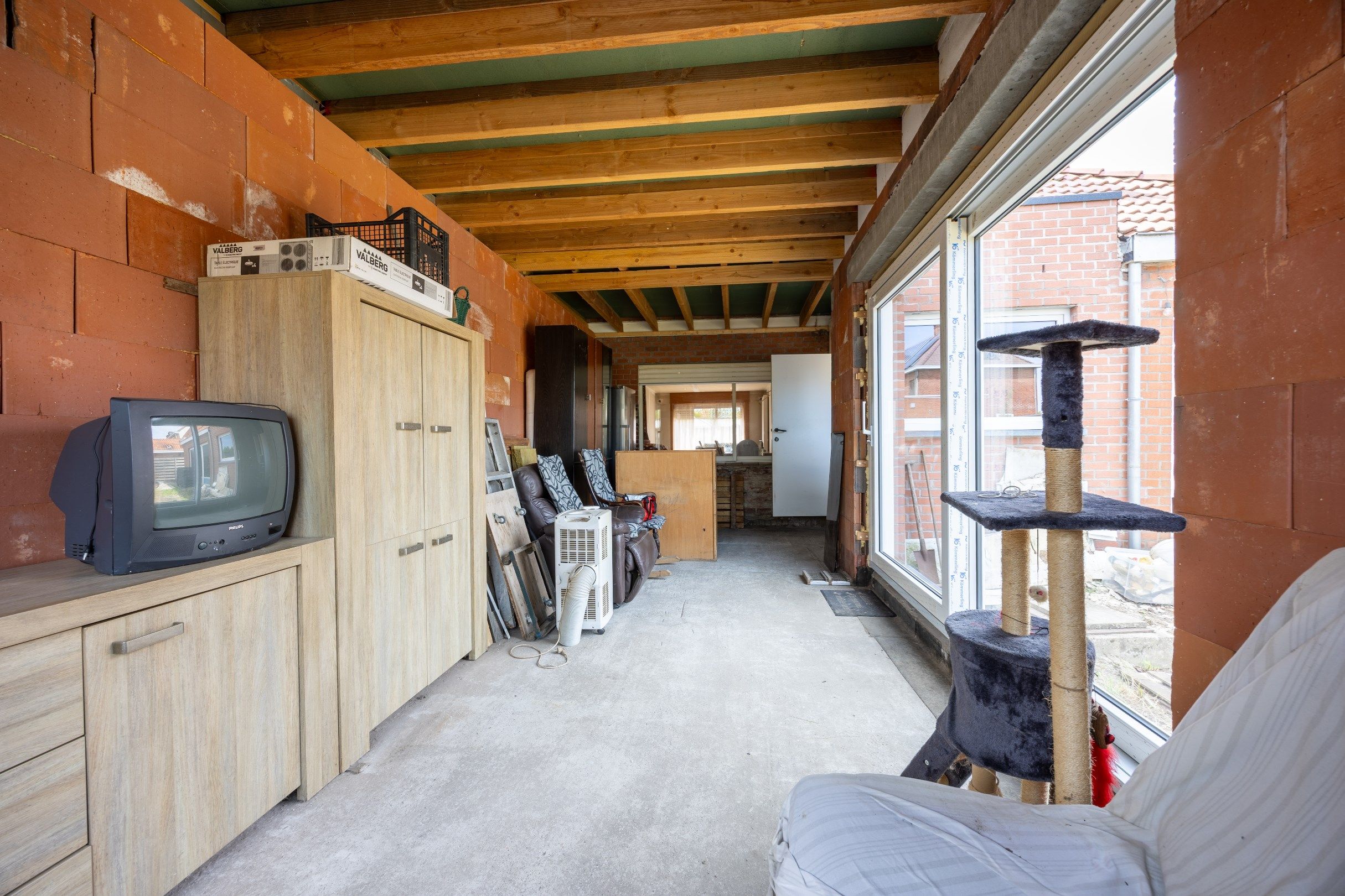 Verder te renoveren halfopen woning met uitweg.  foto 7