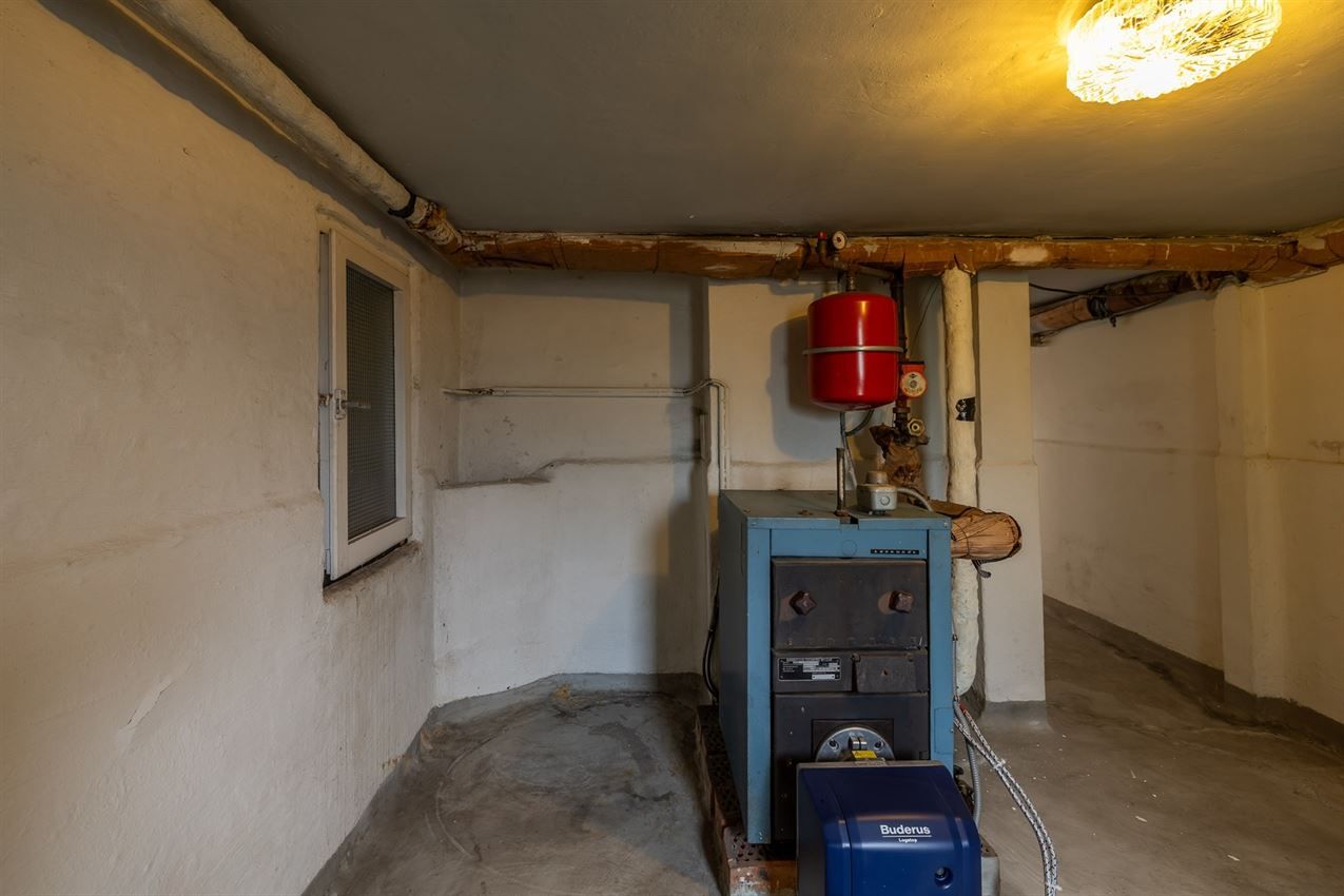 Te renoveren woning met 4 slk. in het hart van Averbode foto 38