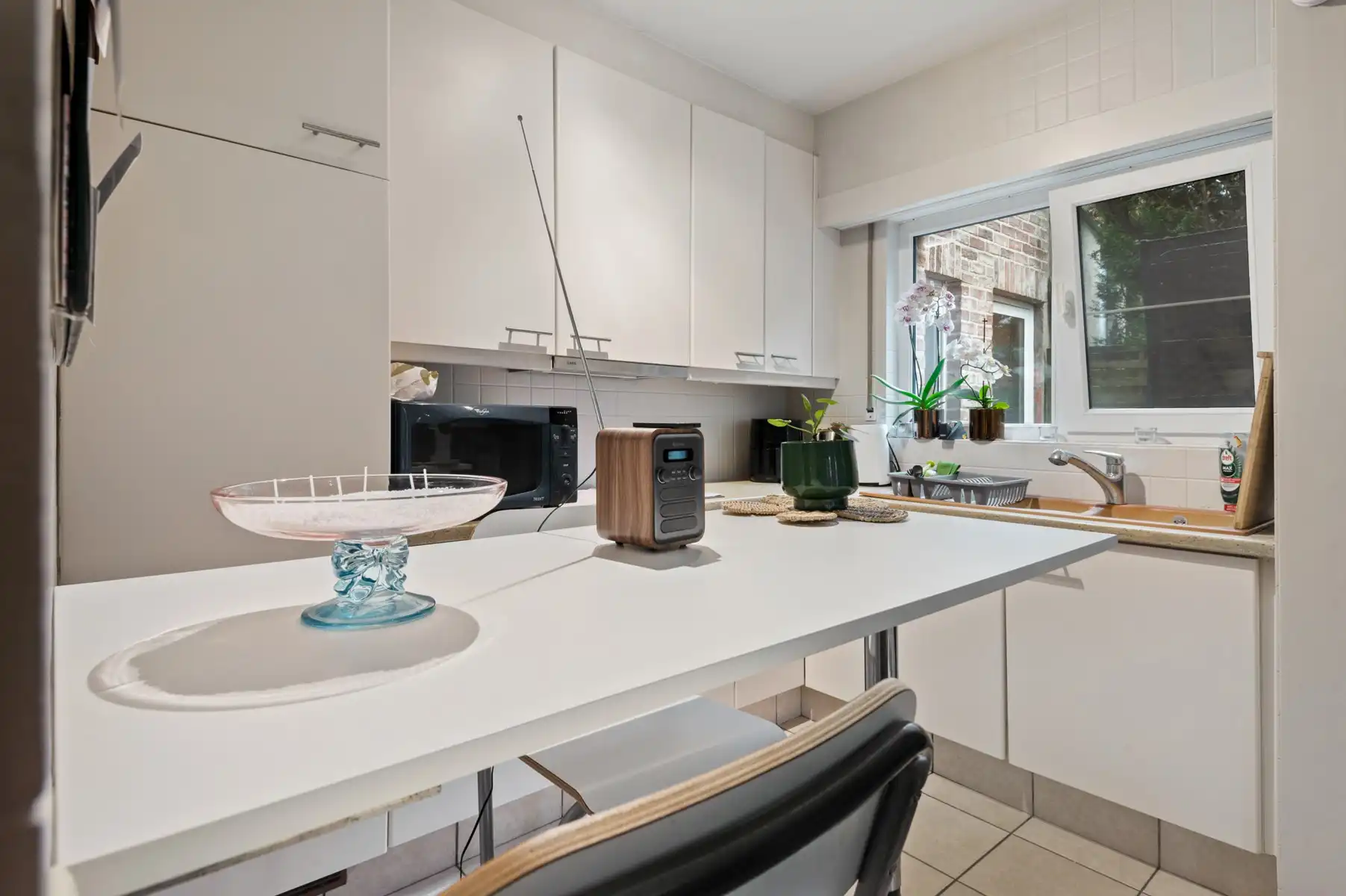 Gelijkvloersappartement met zonnige tuin, garage en staanplaats foto 8