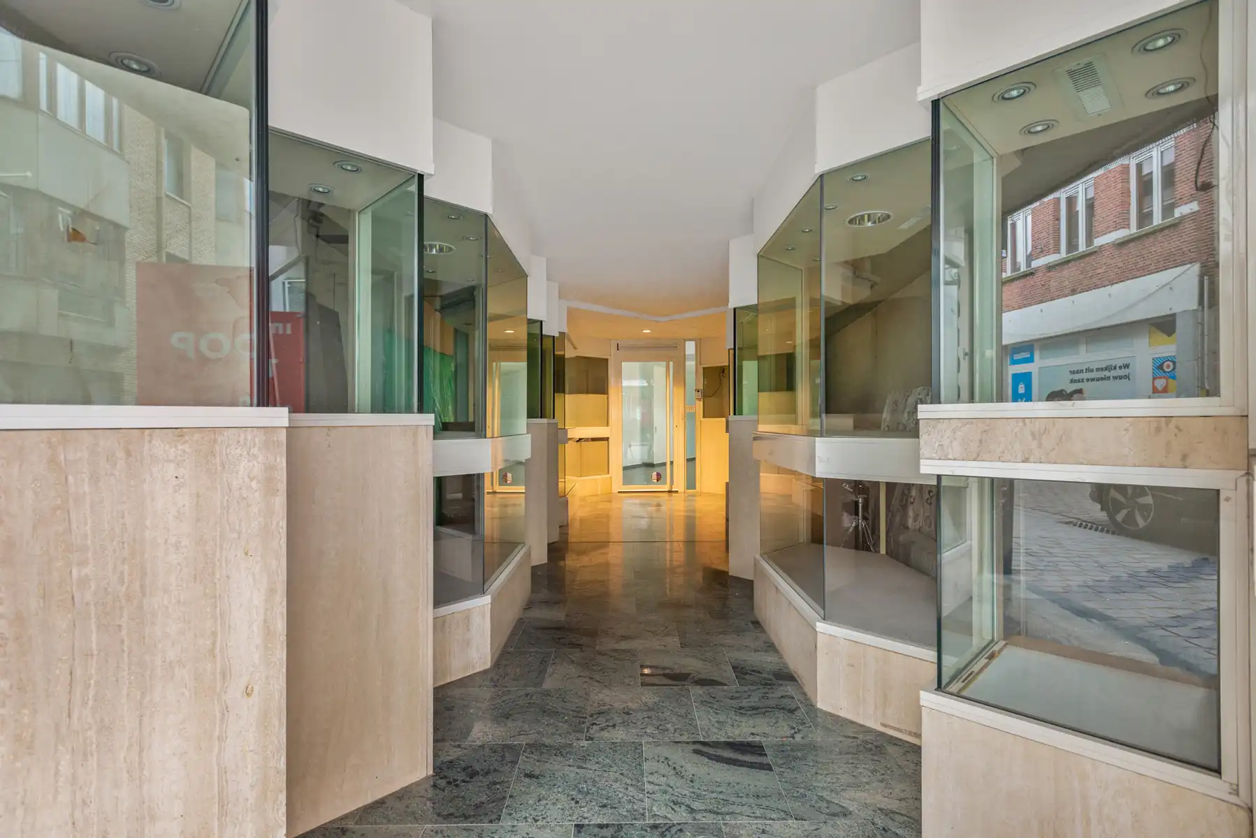 Uniek handelspand mét gerenoveerde woonst in het hart van Boom foto 28