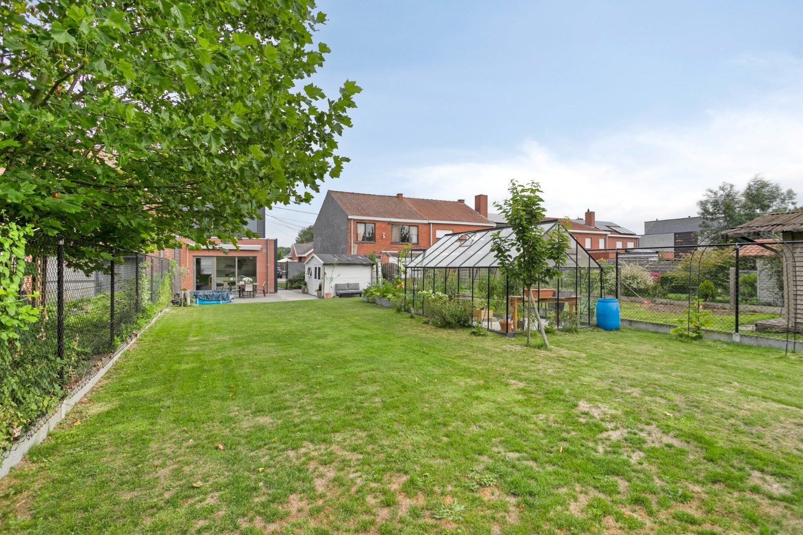 Prachtige instapklare woning met 3 slaapkamers en grote tuin! foto 14