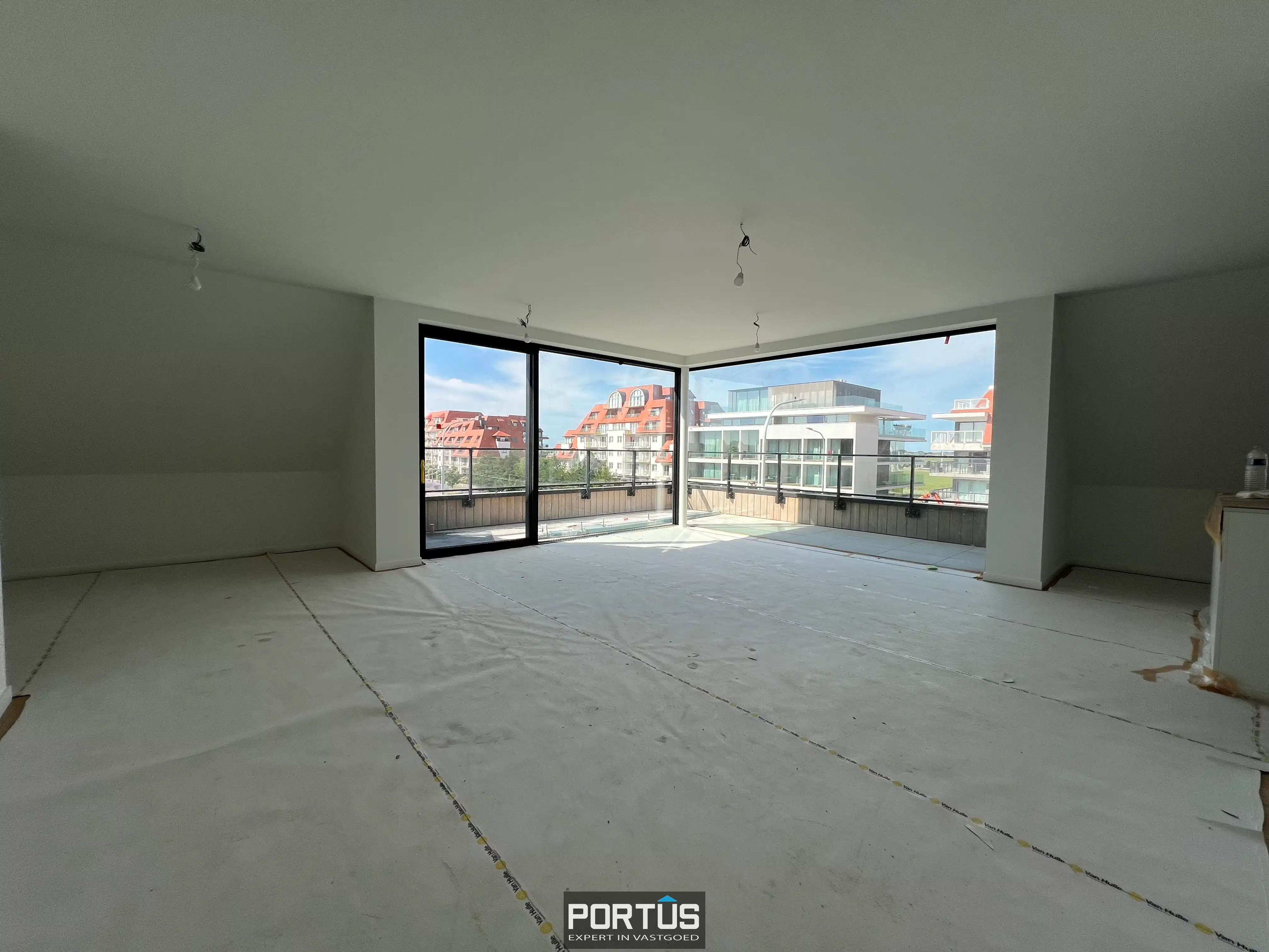 Instapklaar nieuwbouwappartement te koop met 2 slaapkamer in Residentie Portanic te Nieuwpoort foto {{pictureIndex}}