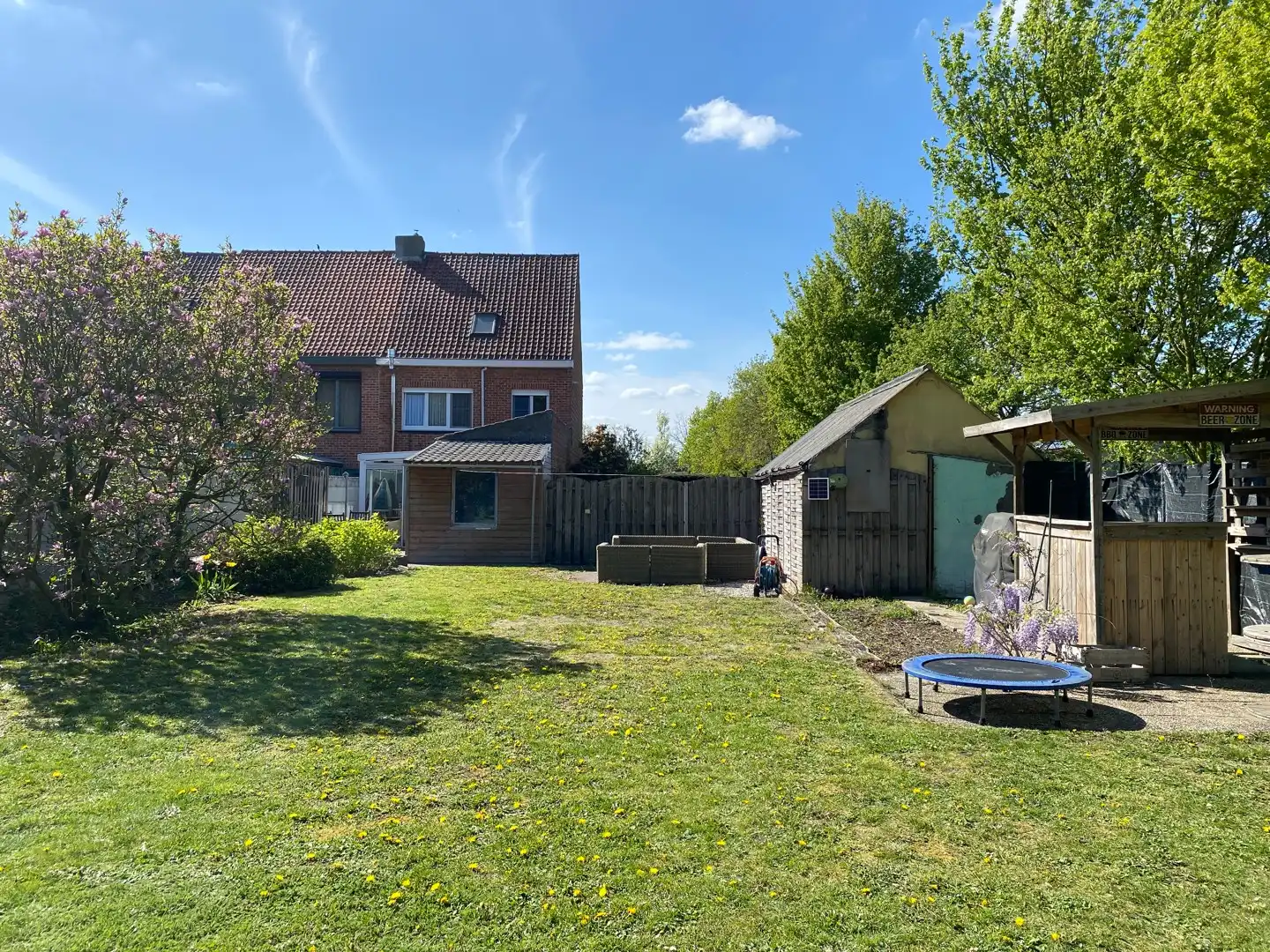 Halfopen woning met grote tuin en garage op ideale ligging foto 12