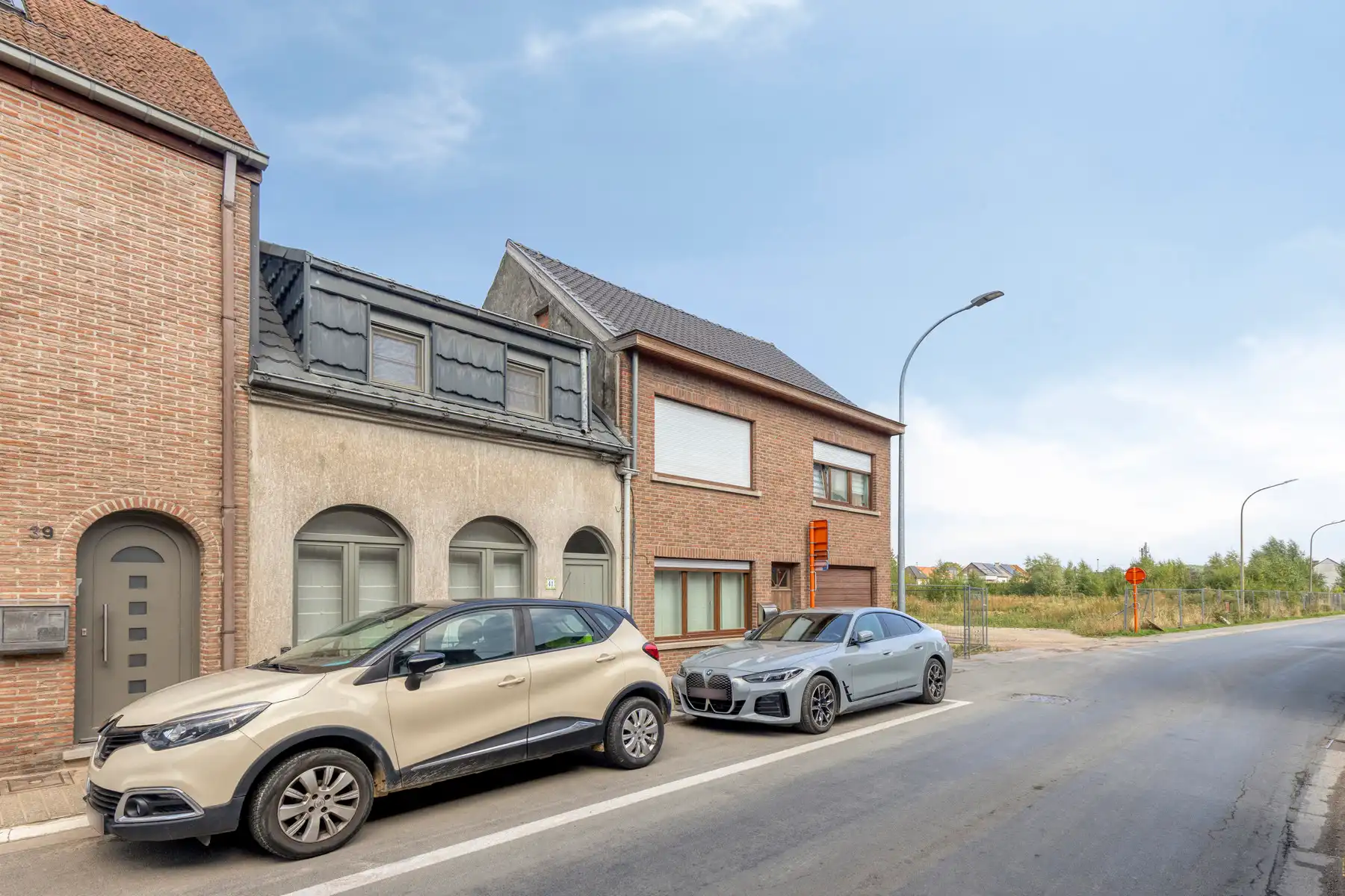 Instapklare woning met gezellige tuin en terras in het centrum van Opwijk! foto 2
