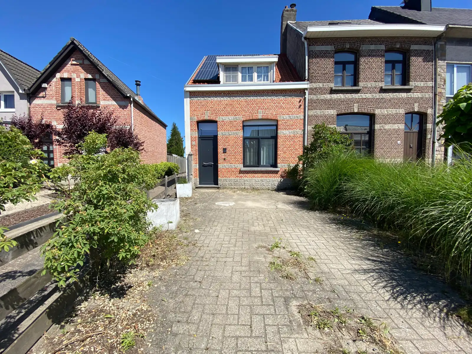 Woning met 2 slaapkamers, tuintje en ruime tuinberging foto {{pictureIndex}}