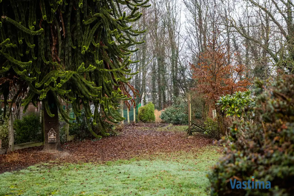 Op te frissen gezinswoning met 3 slaapkamers, garage en tuin foto 25