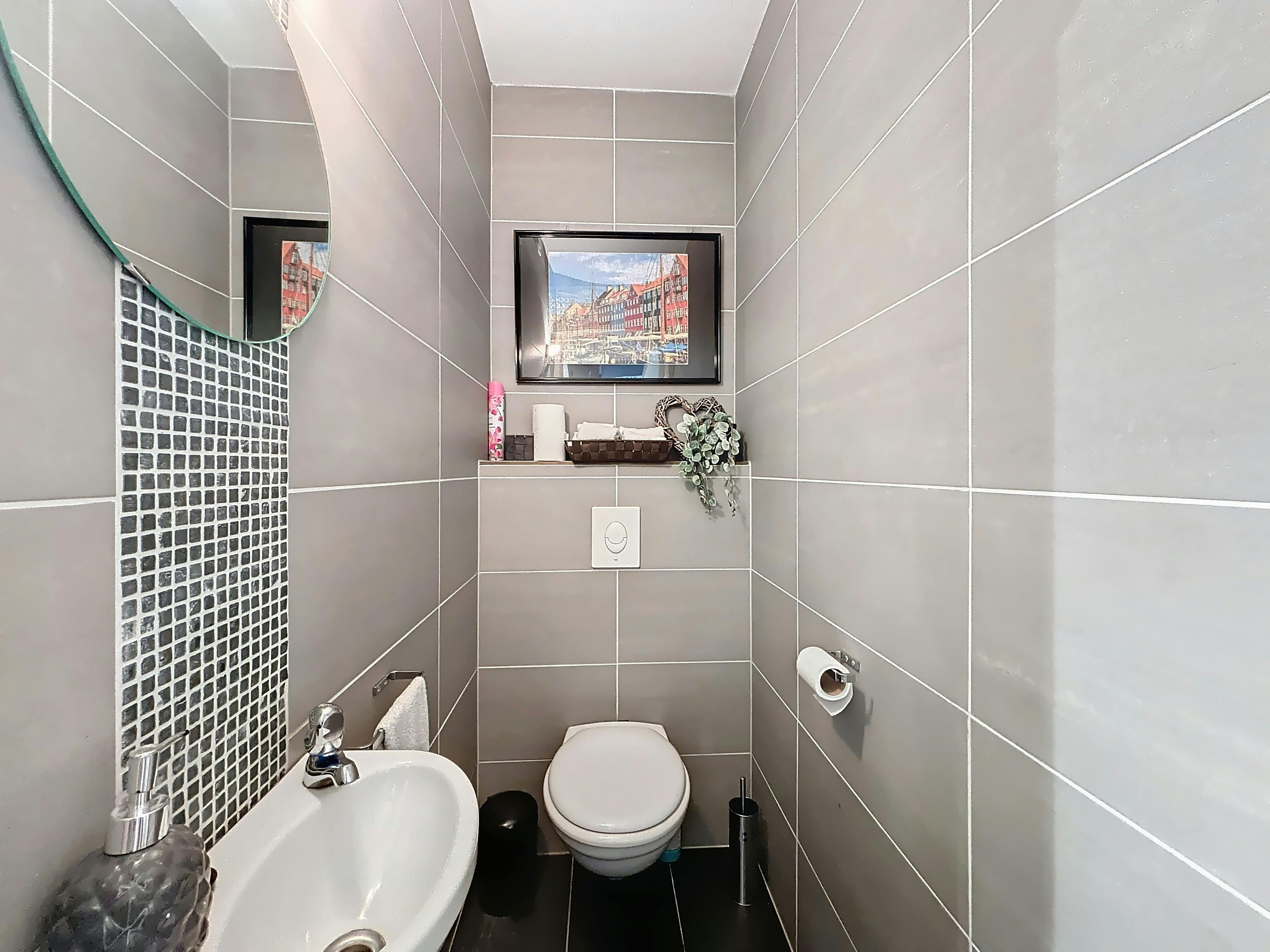 Gezellig gelijkvloers appartement met 2 slaapkamers en tuin foto 8