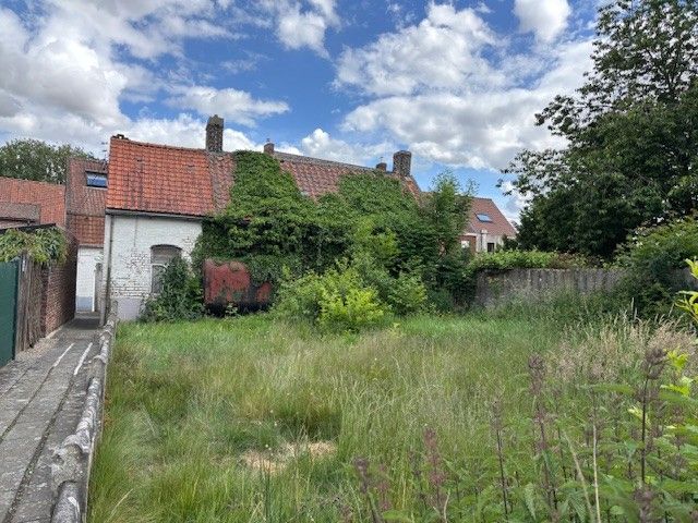Volledig te renoveren huisje met mooi stuk tuin op een totale oppervlakte van 291m². foto 2
