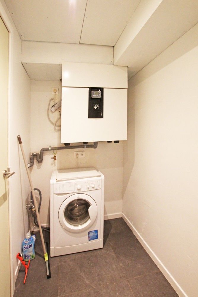 Ruim, gelijkvloers appartement met 2 slaapkamers, terras en een autostaanplaats! foto 14