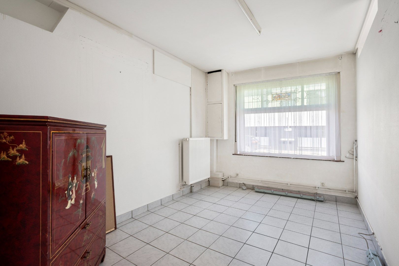Te renoveren hoekwoning op strategische ligging foto 6