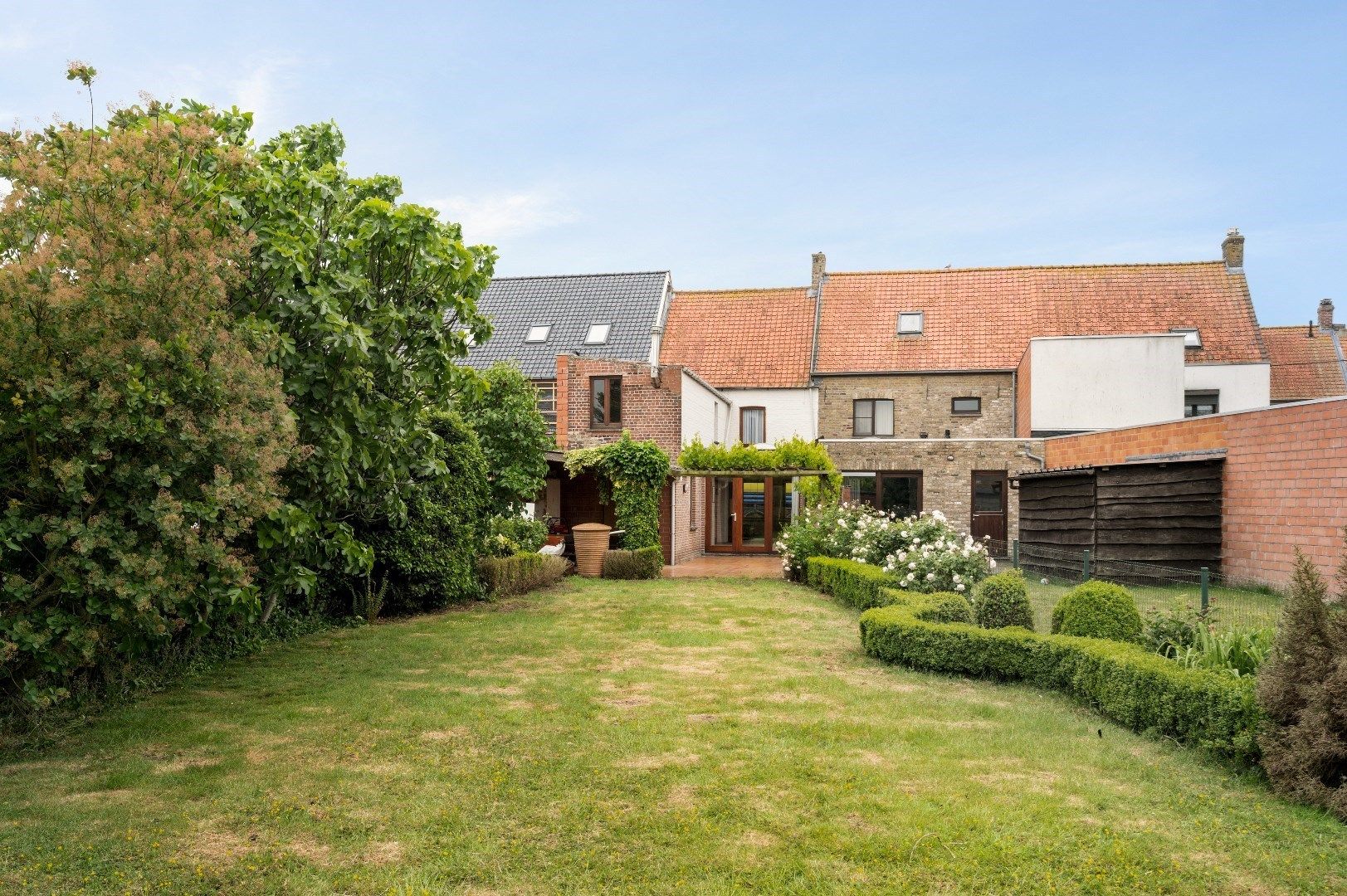 Verrassend ruime woning met 2 slaapkamers en gezellige tuin. foto 20