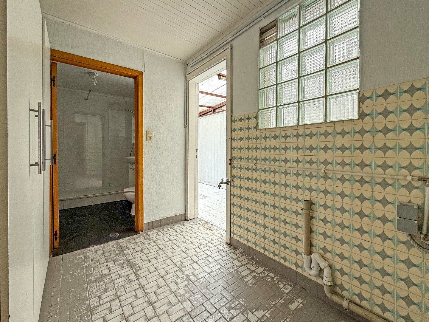 Instapklare rijwoning met garage en zonnige tuin nabij marktplein (157 m²) foto 11