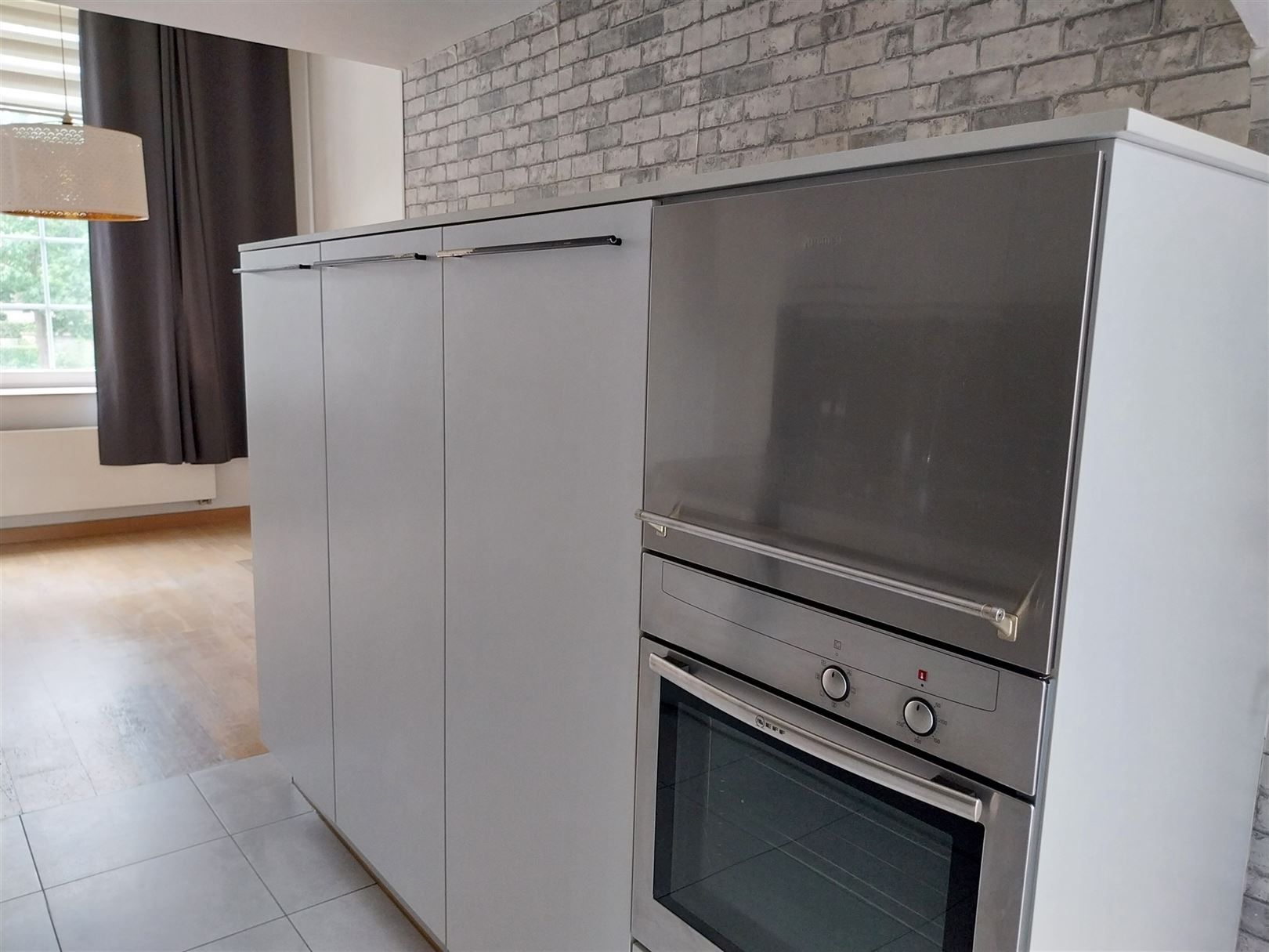 TE HUUR: Gesloten bebouwing in karaktervol gebouw met 2 slaapkamers in Genk! foto 5
