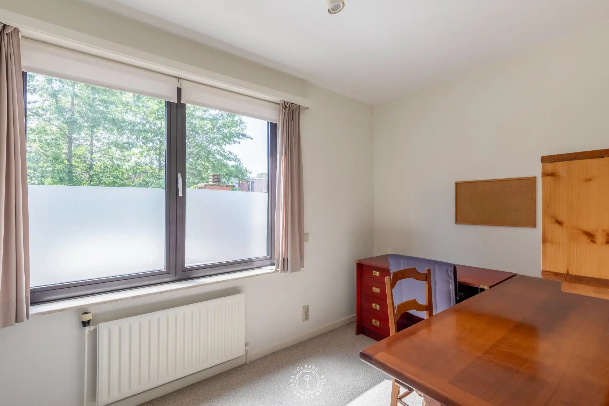 Ruim en lichtrijk appartement met 3 slaapkamers op toplocatie met autostaanplaats aan het Hendrik Heymanplein foto 9