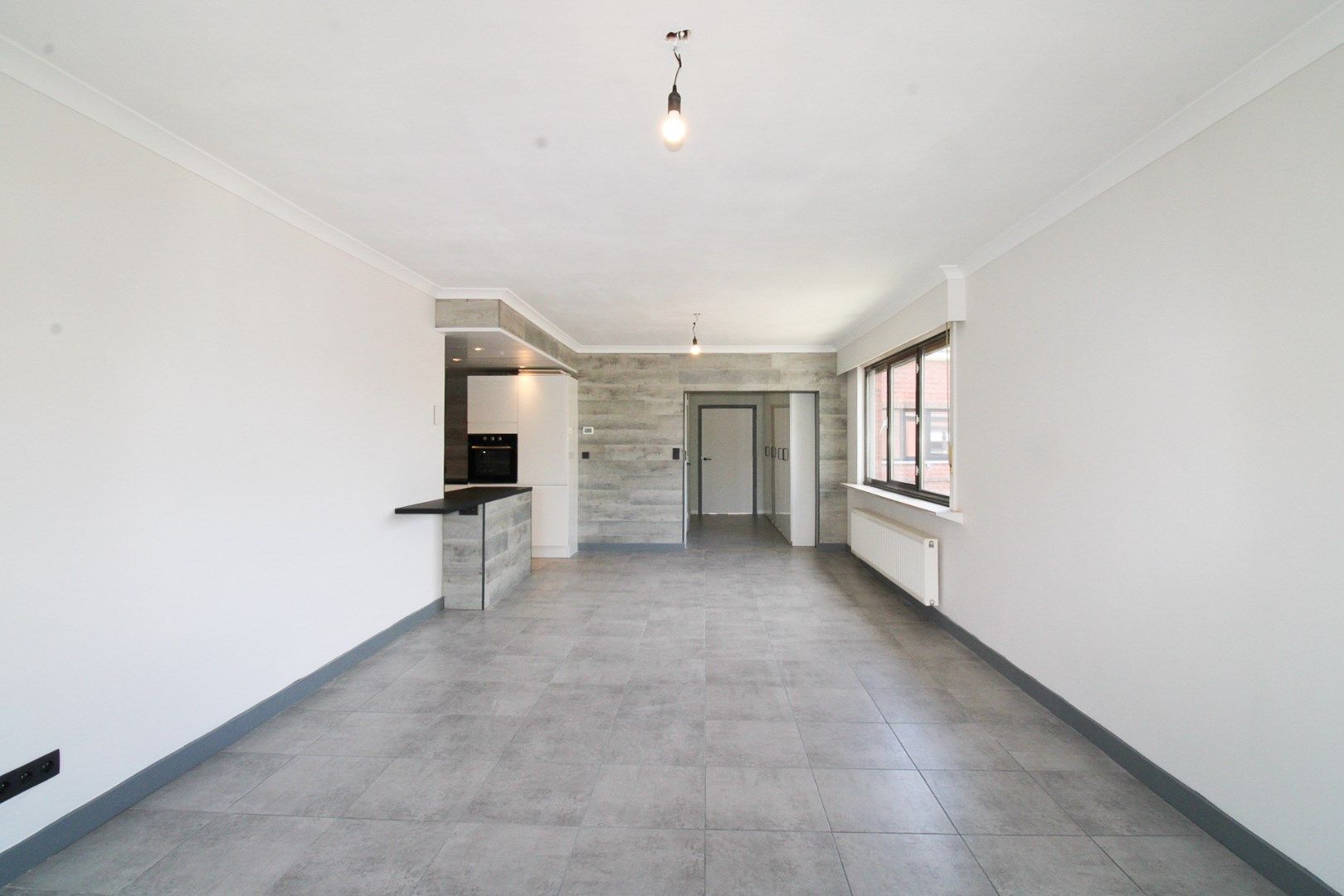 Te koop: Instapklaar en charmant appartement in hartje Hemiksem! foto 1