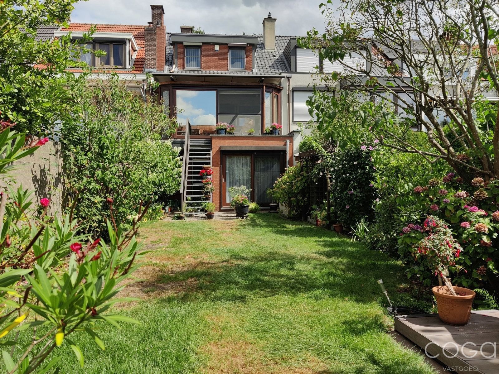 Woning met 4 slaapkamers, garage en tuin foto 26