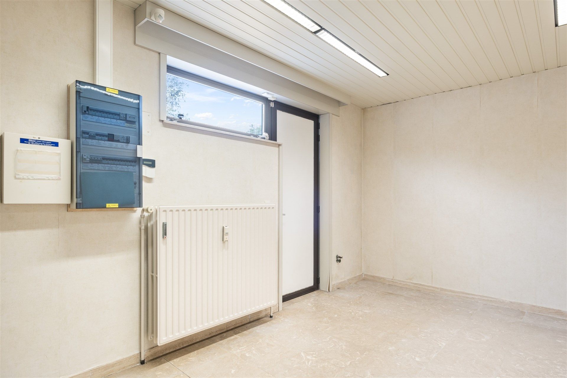 Handelspand met woonst, in centrum overmere met ruime parking en garage.  foto 12