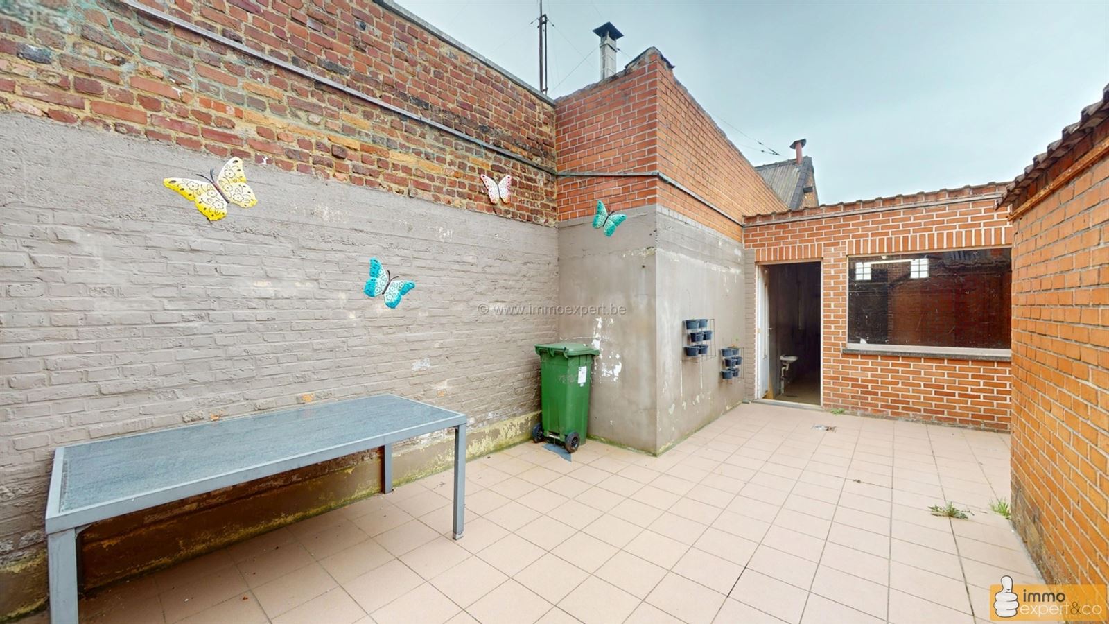 NINOVE: Centraal gelegen woning met 2 slpks, garage en koer foto 9