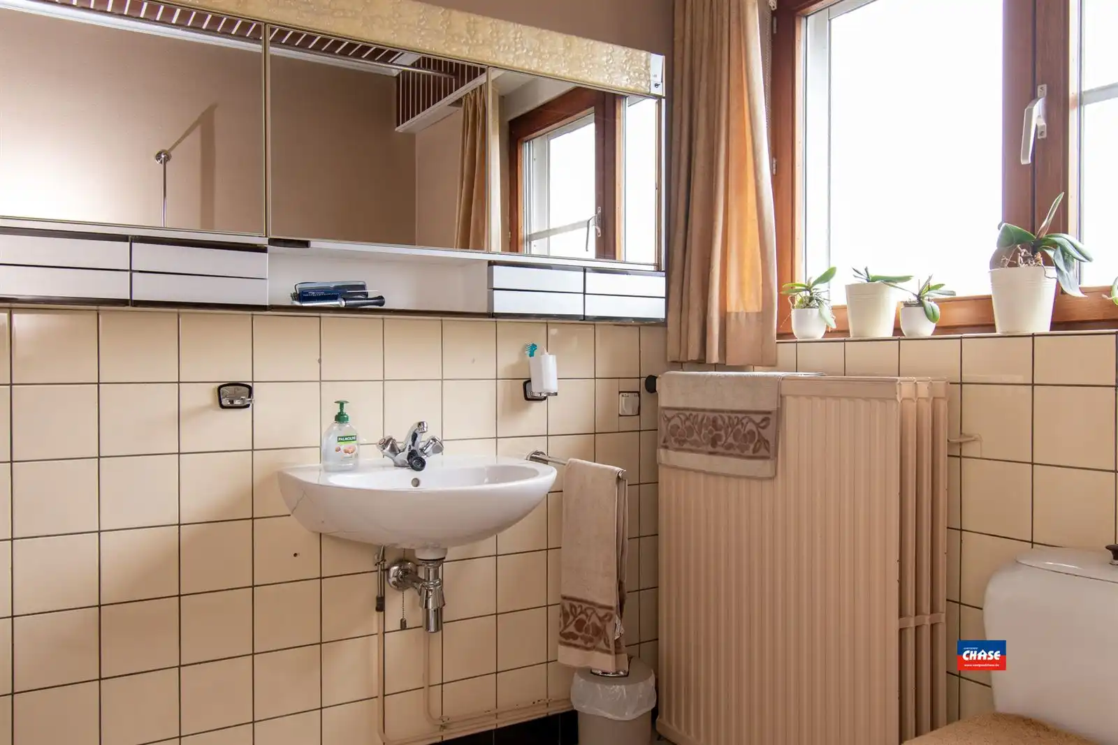 Bel-étage met drie slaapkamers en tuin foto 11